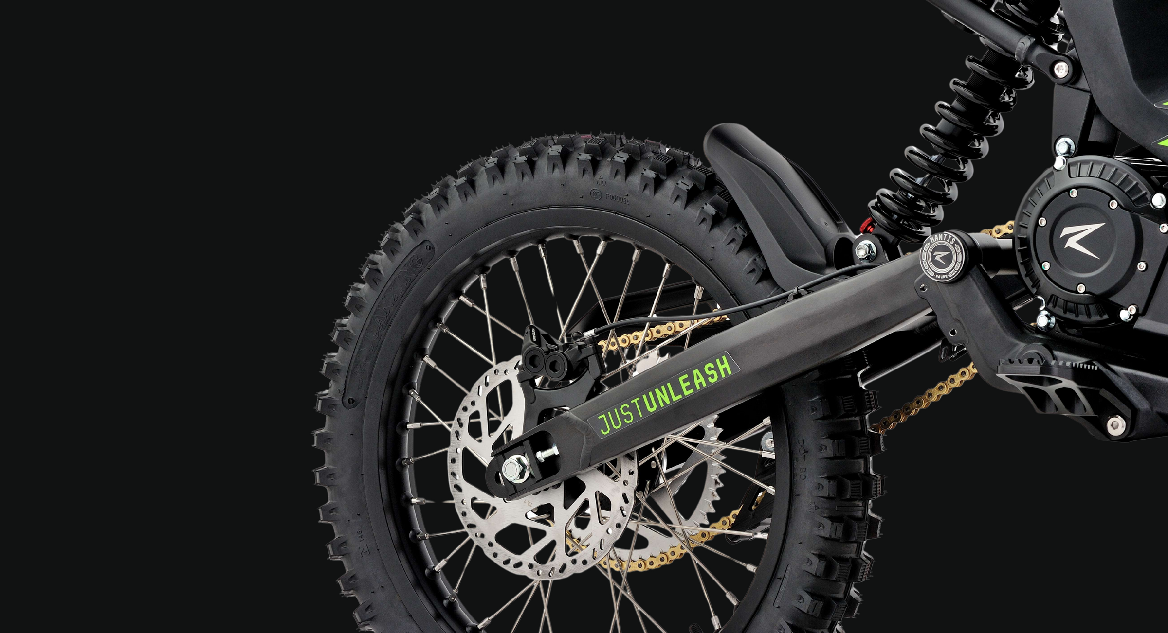 Mantis dirtbike Rear wheel with shock side view