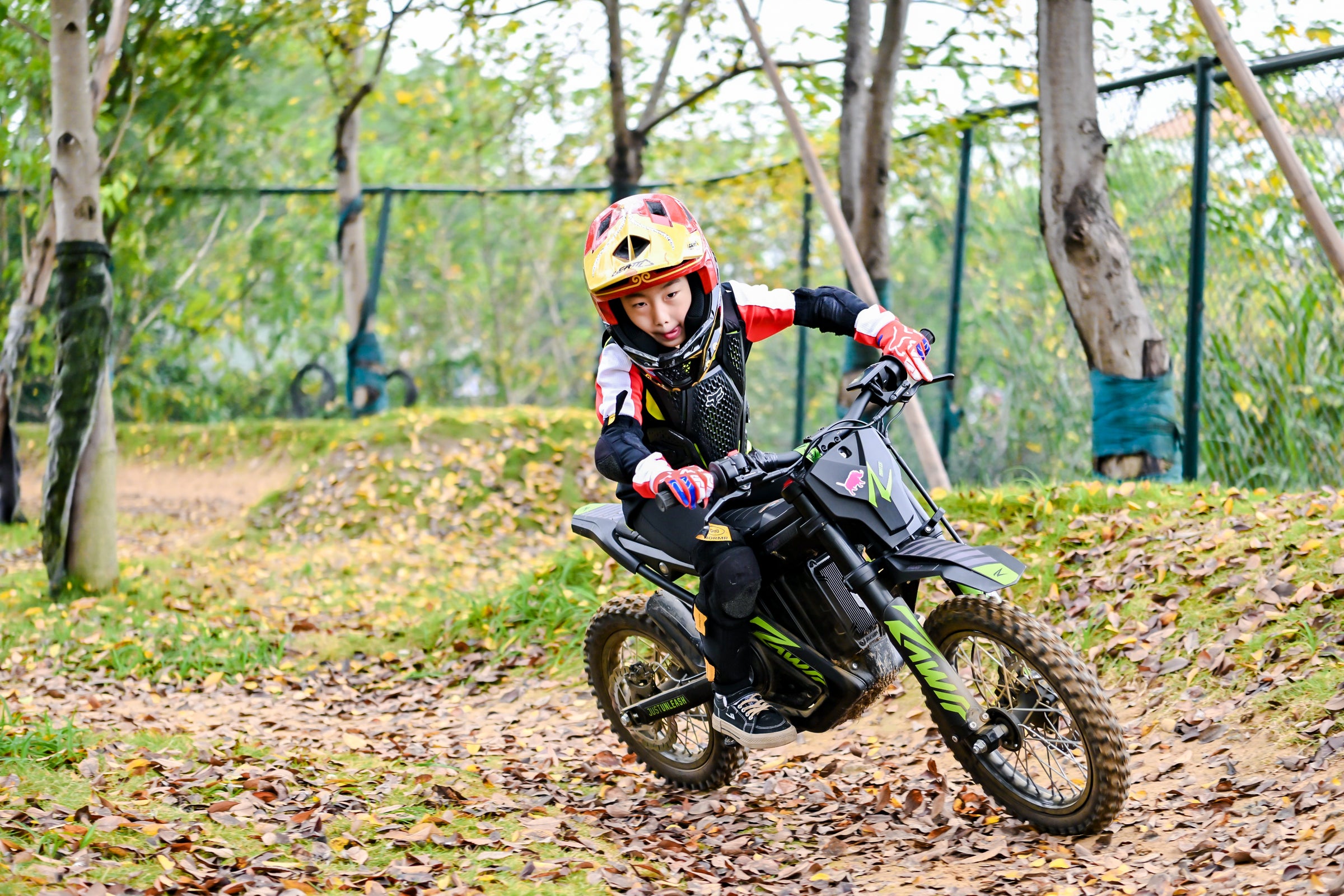 Young boy rides a Mantis Mini R 1